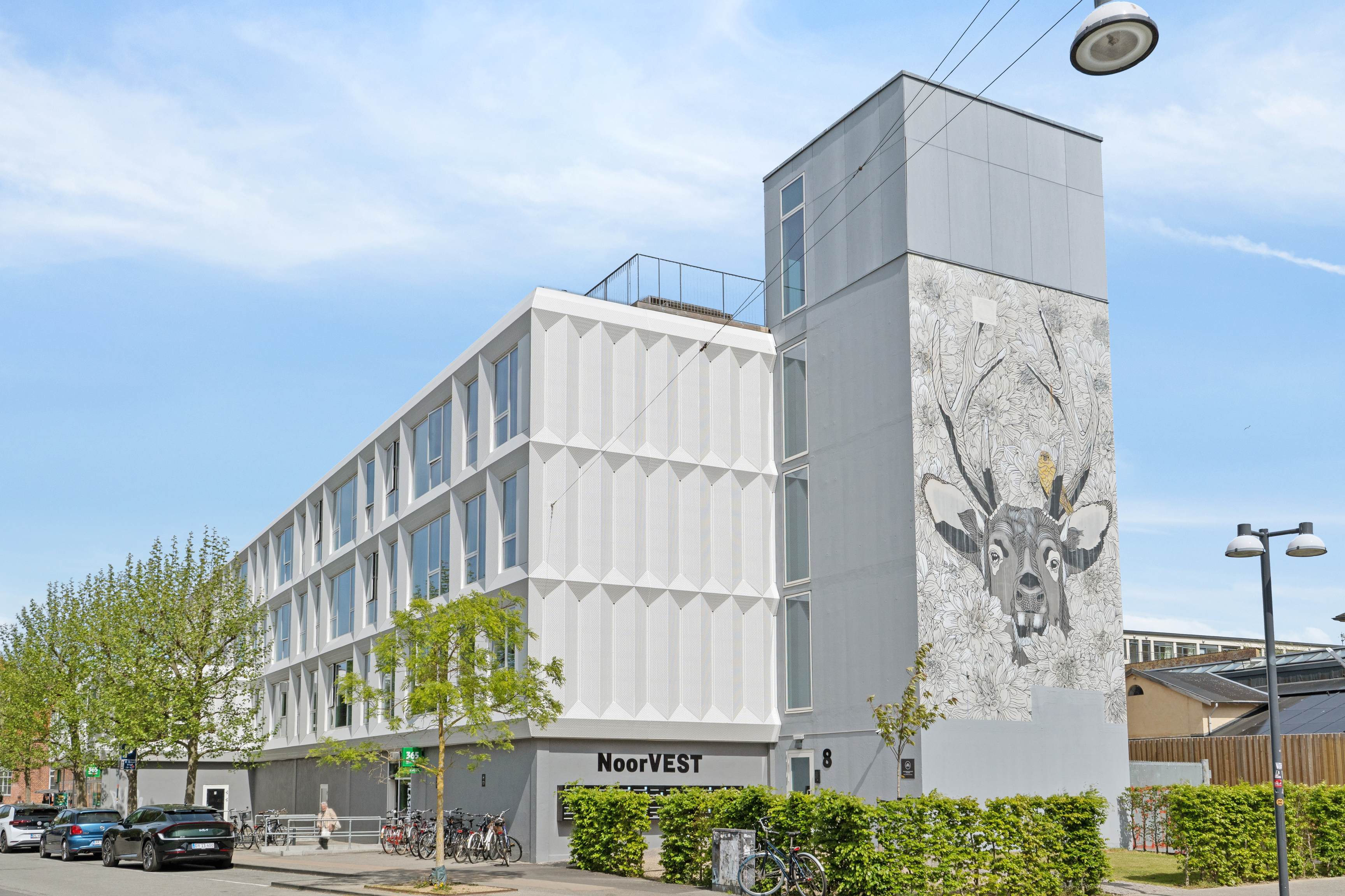 Smedetoften building with deer mural